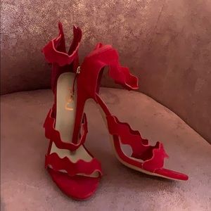 Red zig zag strap heels.